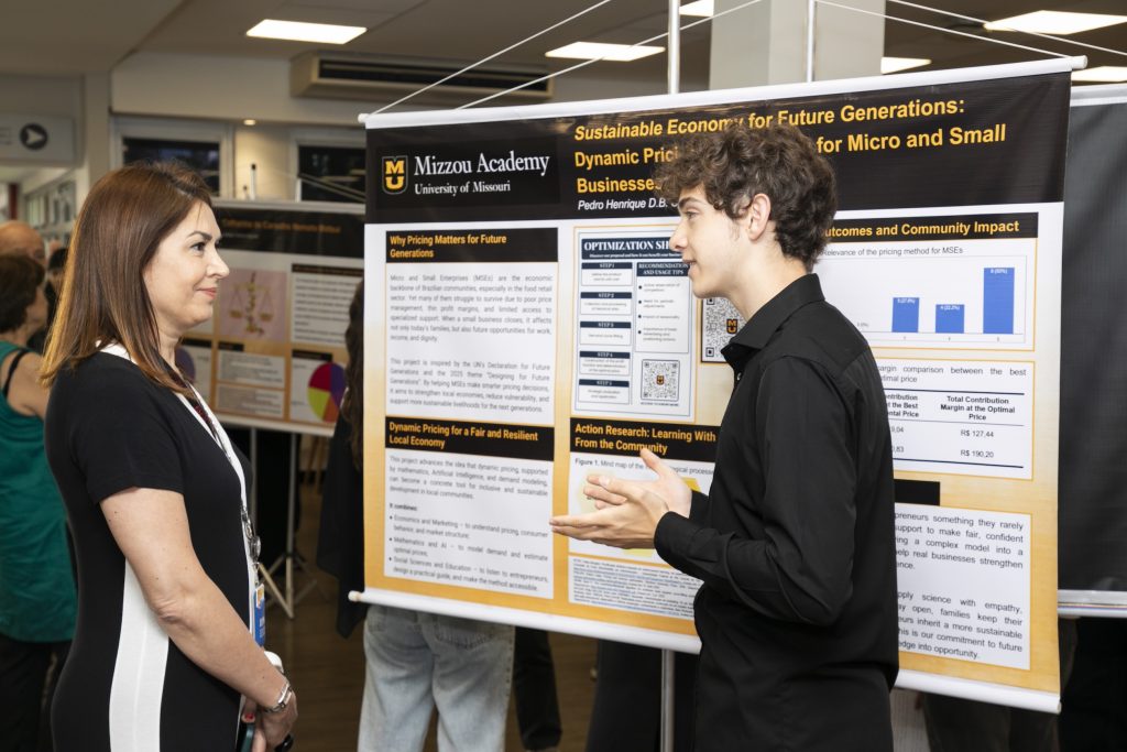 A student presenting their poster.